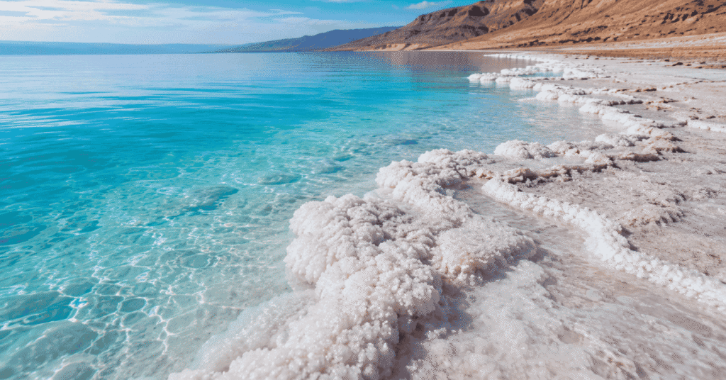 Dead Sea salt formations on the shoreline showing the saltiest body of water on Earth, which helps explain why is the ocean salty through the same salt accumulation mechanism
